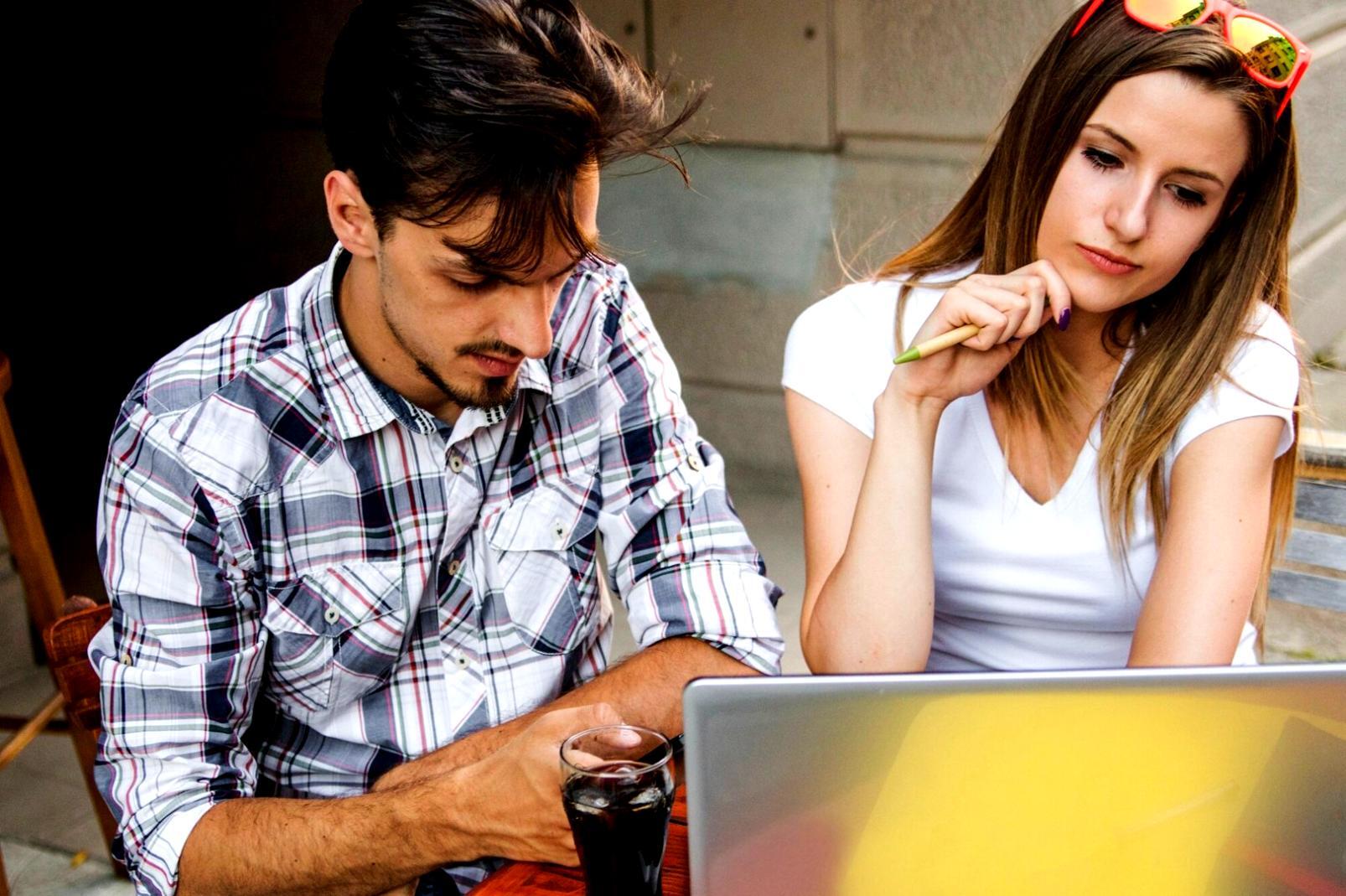 Students analyzing financial statements during interactive workshop session